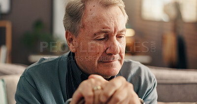 Buy stock photo Sad, think and old man with walking stick, lounge or remember memories of past, retirement and home. Depression, pensioner and elderly person with disability, reflection or unhappy with cane in house