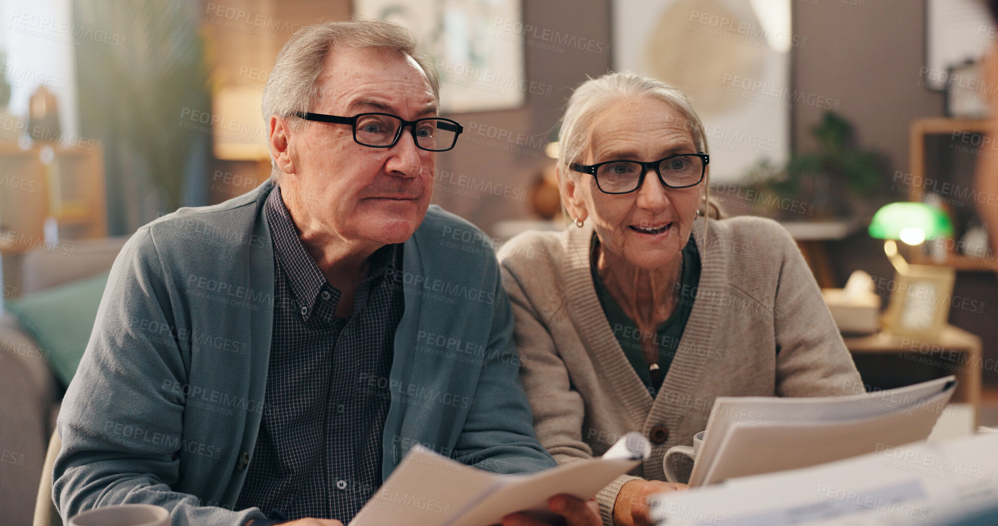 Buy stock photo Senior couple, paperwork and financial advisor in home with listening, info and review for pension. Elderly people, documents and attention on sofa with investment, funding and income for retirement