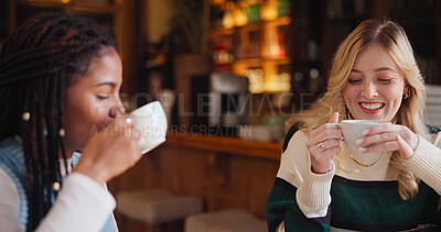 Coffee shop, happy and women with drink in conversation for hangout, reunion and bonding. Restaurant, cafe and people with beverage, talking and gossip for relaxing, social chat and friendship