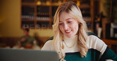 Buy stock photo Happy, student and woman on laptop in coffee shop for learning, online education and assignment in cafe. Restaurant, reading and person on computer for research, school project and university lesson