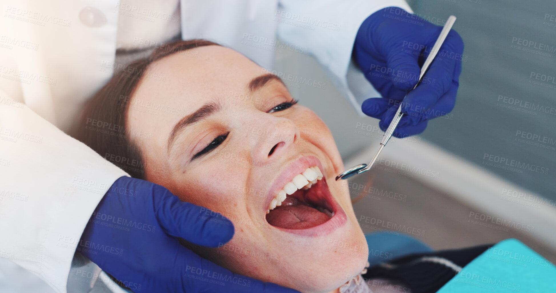Buy stock photo Dental mirror, consultation and orthodontist with woman for treatment of tooth decay, cavity or oral care. Checkup, health and dentist with female patient for procedure with medical tool in clinic.