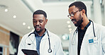 Men, doctor or research with tablet for medical discovery, innovation or statistics at hospital. Male people, employees or healthcare workers on technology for telehealth app or information at clinic