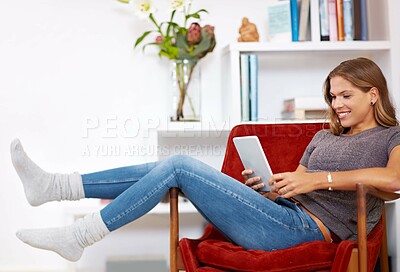 Buy stock photo Movie, relax or happy woman on tablet in house with internet connection for film, video or research online. Smile, chair or girl on social media blog for technology, streaming or subscription in home