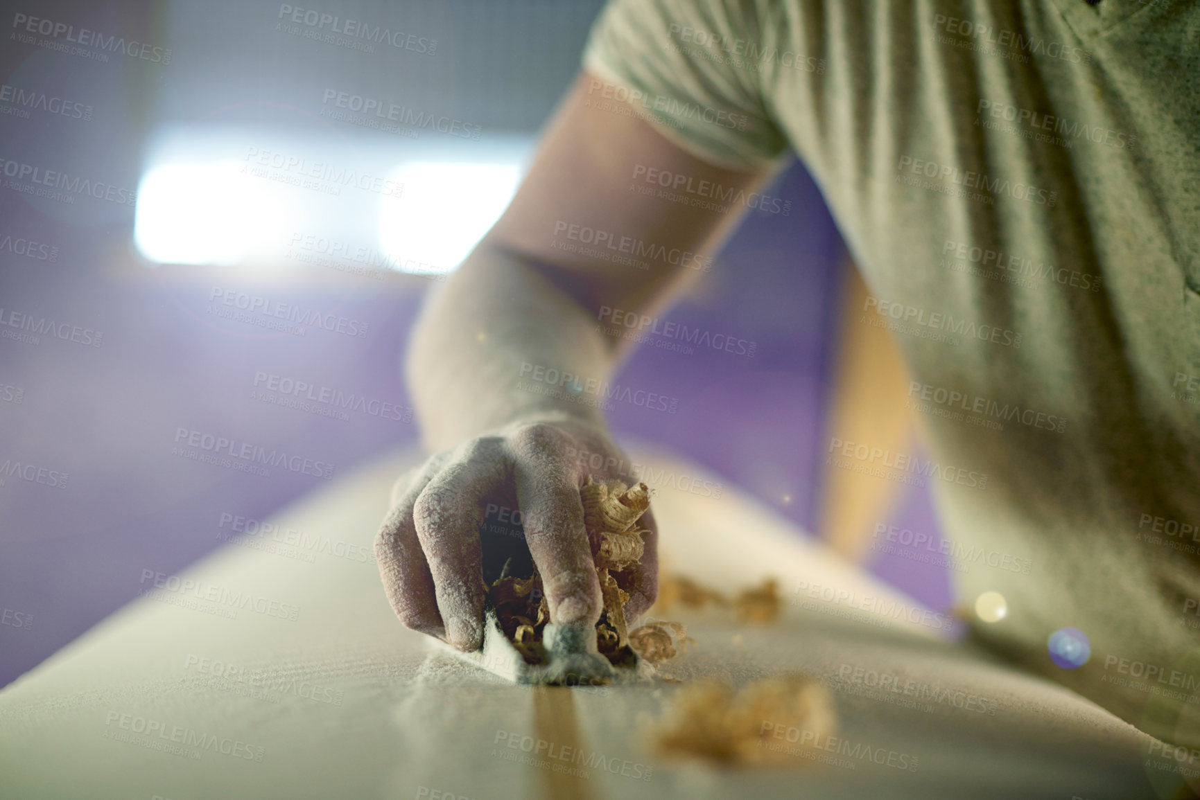 Buy stock photo Manufacturing, hand and person with planer on surfboard for production process, polish and creative craftsmanship. Surfer, blank and tools for shape, design and shaving wood surface in workshop