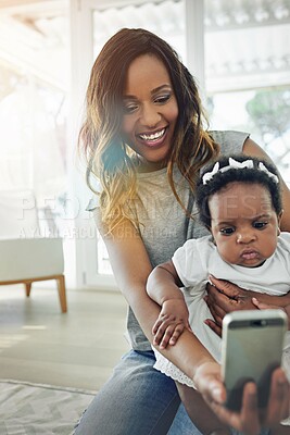 Buy stock photo Happy, mother and baby for selfie, memories and child development milestones on floor at home. Smile, mom and toddler for nostalgia recording of childhood for bonding and social media post or update
