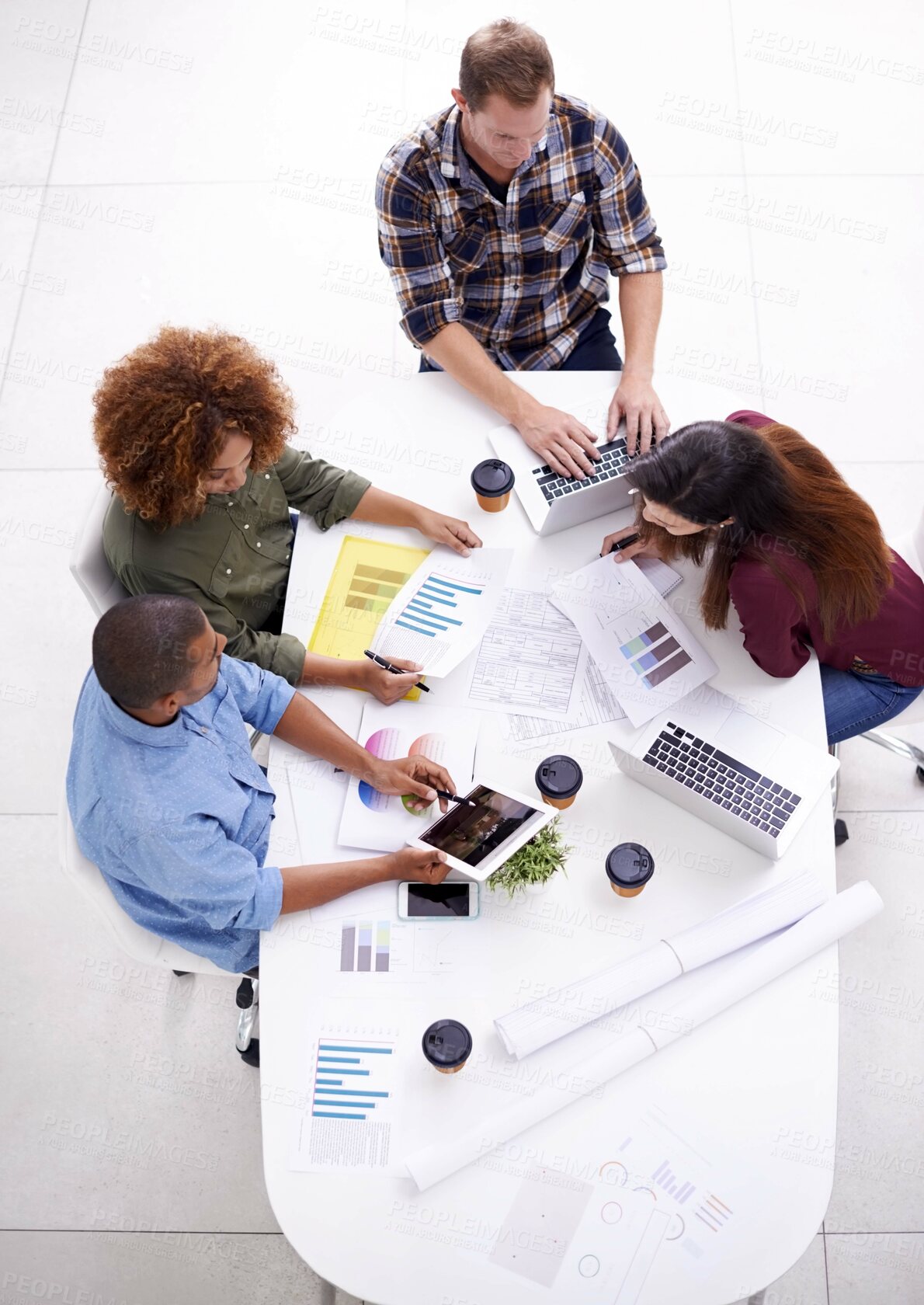 Buy stock photo Top view, office and business people in meeting, brainstorming and documents with charts, feedback and cooperation. Collaboration, group or planning with ideas, paperwork or teamwork with review