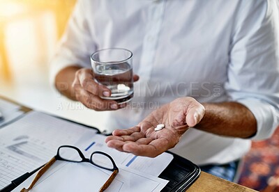 Buy stock photo Businessman, drinking water and hands with pills for medicine dosage, painkillers or medication. Migraine, paperwork or financial advisor with tablets, glass or closeup for headache and supplements
