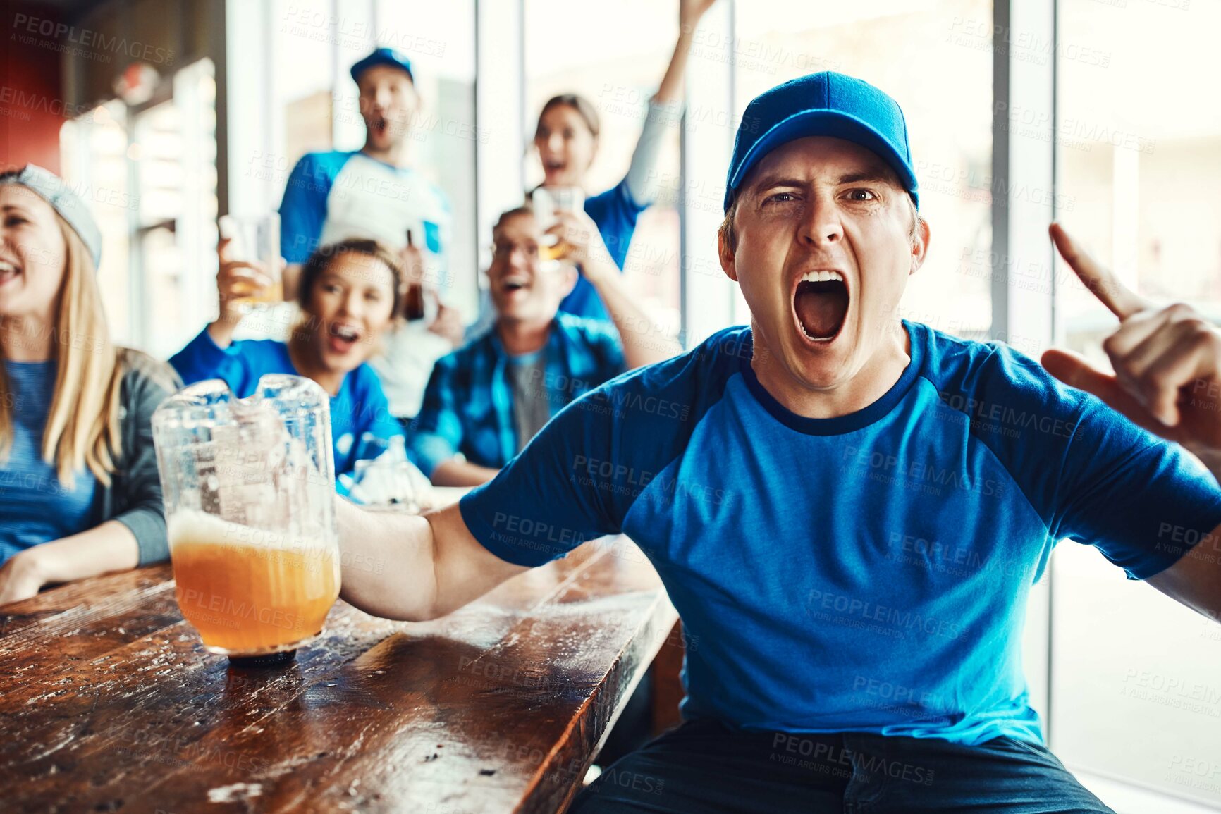 Buy stock photo Man, celebration and goal at pub in cheering for victory in watching tv, sports game as supporters or team. Person, excited and beer for winning in football game as friends for loyalty in world cup