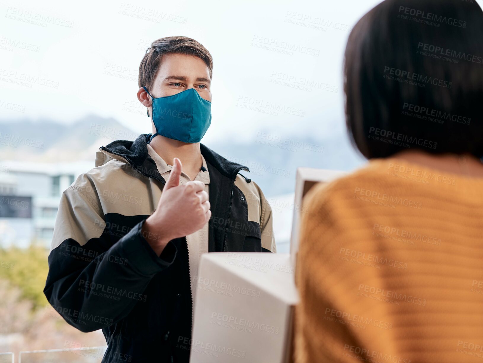 Buy stock photo Delivery man, thumbs up and woman with boxes on mask at home for online shopping, package and parcel. People, employee and customer on pandemic with courier for social distancing and quarantine