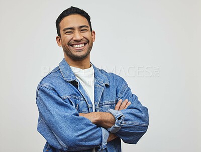 Buy stock photo Happy, man and portrait with arms crossed, fashion and modern style in a studio with smile. Trendy, denim and cool outfit with confidence and classic casual clothes with jacket and grey background