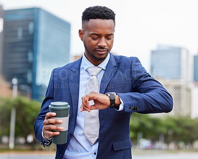 Buy stock photo Shot of a confident young businessman out in the city