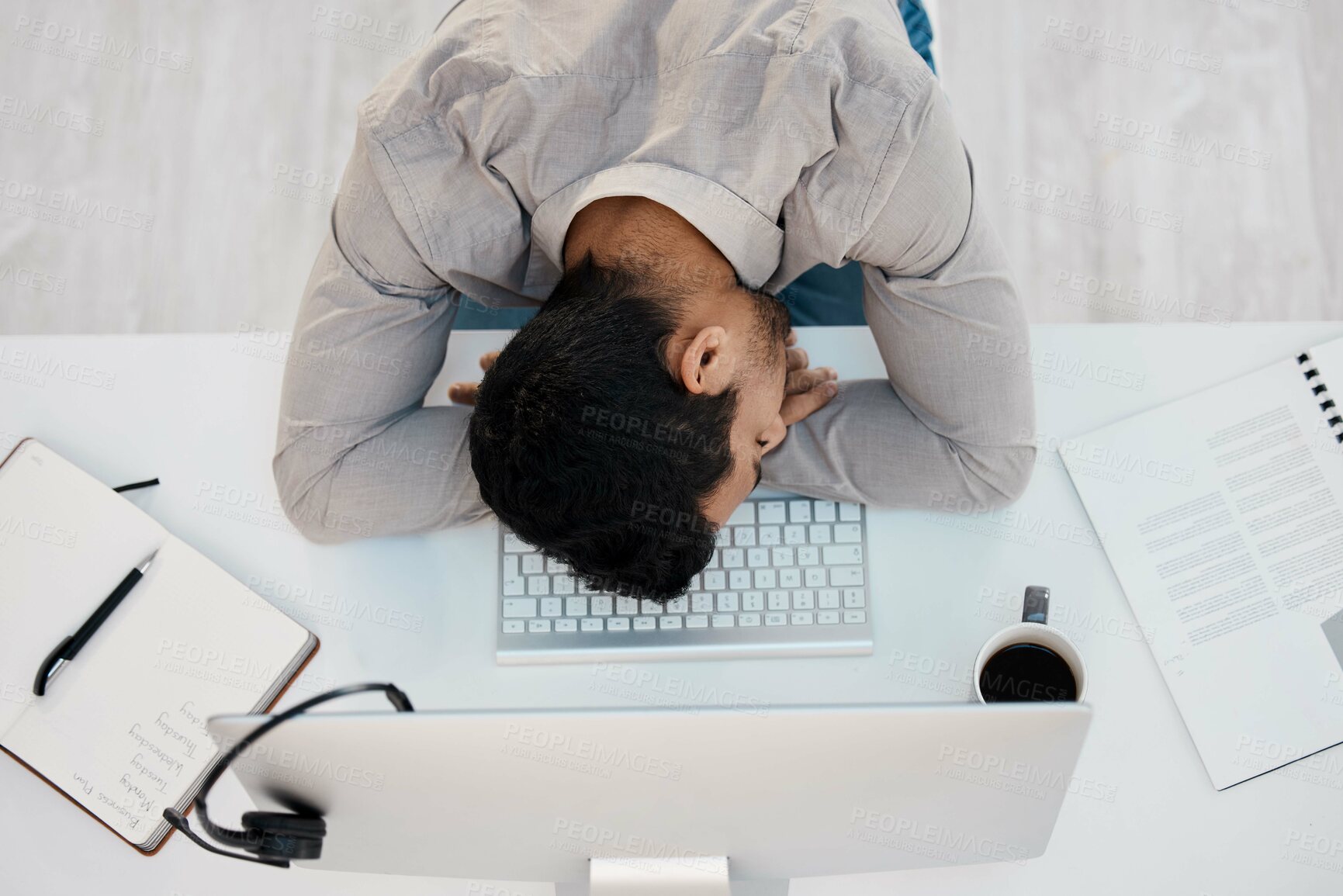 Buy stock photo Man, desk and sleeping at call center for tired fatigue or telemarketing, customer service or top view. Male person, computer and overtime for tech support or burnout with stress, nap or exhausted