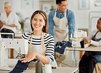 Fashion, design and style with a young designer working in a startup on a sewing machine in a workshop. Busy and creative designer creating new, trendy and fashionable clothes in a small business