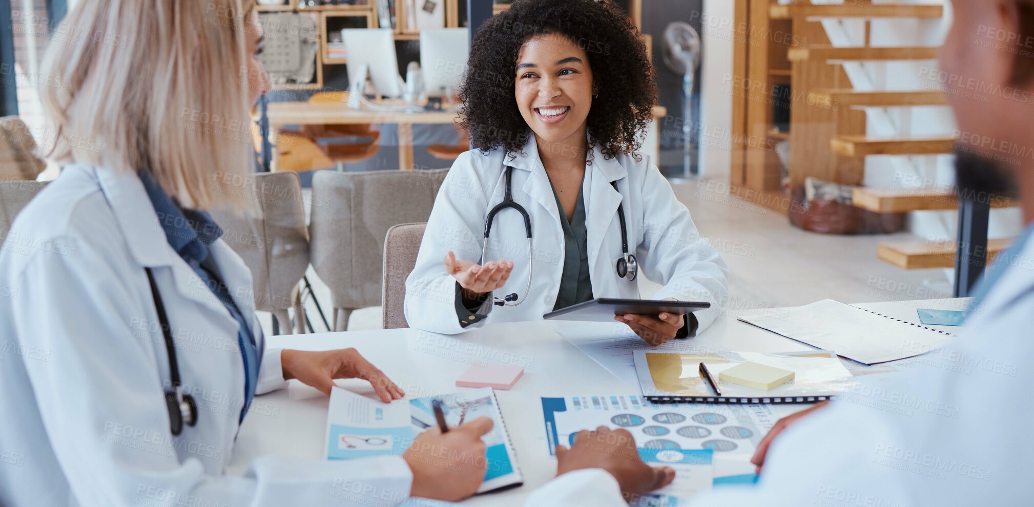 Buy stock photo Medical doctors talk about research, consulting each others scientific opinion and giving expert analysis of patients health. Clinics can help people by providing quality services that are affordable