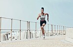 Running, black woman and beach marathon training, fitness and wellness for sports goals, body motivation and energy outdoors. Focus, speed and cardio runner athlete, ocean exercise and summer workout
