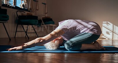 Buy stock photo Senior woman, stretching and yoga exercise in living room for fitness, cardio and wellness on mat studio training. Retirement, workout and pilates elderly retired person exercising legs on floor