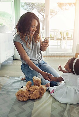 Buy stock photo Black woman, baby and photography with smartphone on floor for memories, filming and child development at home. Excited, mom and toddler with teddy bear for recording, social media and kid update