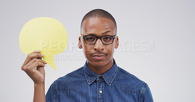 Buy stock photo Attitude, portrait and speech bubble with black man in studio for communication, opinion or voice. Glasses, message and mockup space with African person isolated on white background for social media