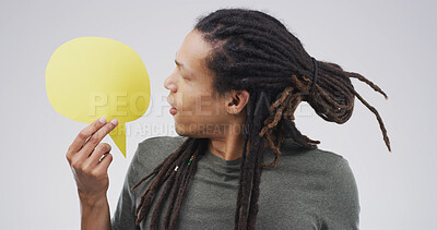 Buy stock photo Communication, speech bubble and man in studio, feedback and announcement on white background. Person, social media or chatting poster with decision, information sign or opportunity with voice review