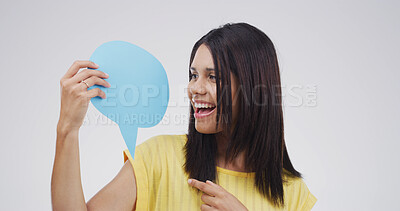 Buy stock photo Woman, smile and point with speech bubble, studio or choice with mockup space by white background. Excited person, happy and poster for opinion, announcement or decision with sign for social media