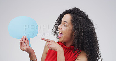 Buy stock photo Pointing, speech bubble and woman in studio, excited and announcement on white background. Person, social media and chatting poster with gesture, communication and opportunity with voice review