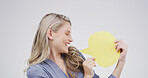 Smile, woman and talking with speech bubble in studio for announcement, news and signage. Mockup space, person and sign for advertising brand, show information and billboard forum in white background