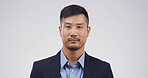 Serious, portrait and businessman with pride, studio and ambition for financial growth or corporate. White background, entrepreneur and Asian person with opportunity for career development and China