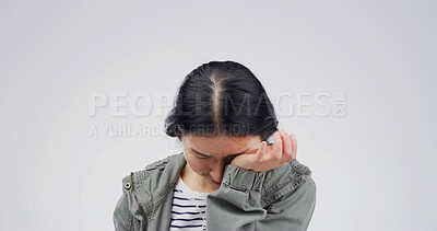 Buy stock photo Sad woman, stress or crying with grief in studio for mistake or depression on a white background. Female person, model or breakup with emotion, sob or mental health for abuse, loss or crisis on space