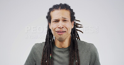 Buy stock photo Sad, crying and portrait of man in studio for depression, heartbreak and crisis. Mental health, overwhelmed and rejection with person on white background space for shame,  mistake and emotional