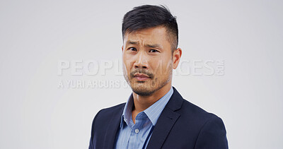 Buy stock photo Confused, thinking and portrait of business Asian man in studio for choice, doubt and fake news. Decision, reflection and question with person on white background space for brainstorming and review