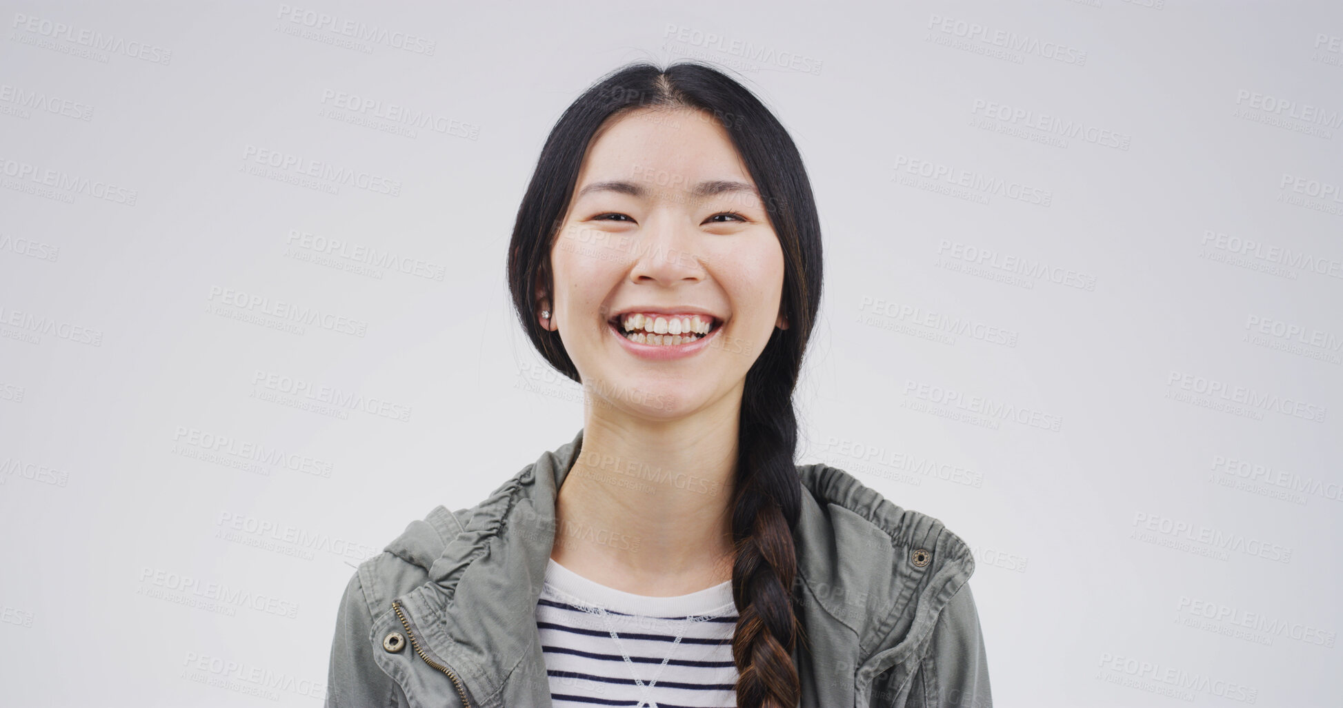 Buy stock photo Laughing, smile and portrait of woman in studio with mockup space for comedy joke with humor. Goofy, happy and Japanese female person with giggle for funny, gossip or silly comic by white background.