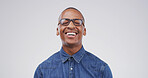 Happy black man, studio and laughing at joke, comedy and excited isolated on white background. LOL, smile and African person with funny story, silly and comic expression for euphoria with space