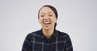 Buy stock photo Portrait, happy and woman laughing in studio with expression, funny joke and reaction to meme. Smile, female person and humor with positive attitude, good vibes and silly emotions on white background