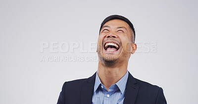 Buy stock photo Comedy, humor and laughing with business man in studio for expression or reaction to joke and meme. Comic, funny and space with happy employee isolated on white background for joy or motivation