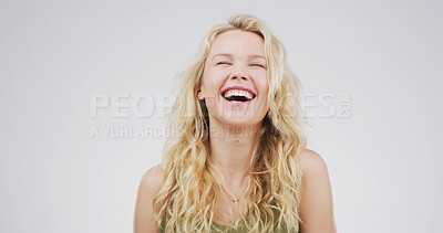 Buy stock photo Laughing, smile and face of woman in studio with funny joke, humor or comedy on white background. Happy, confidence and isolated person with laughter for positive attitude, silly or excited for comic