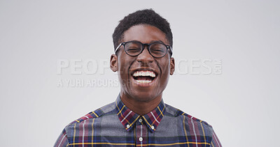 Buy stock photo Laugh, happy and face of black man in studio with funny joke, humor and comedy on white background. Emoji, mockup space and person with laughter for positive attitude, cheerful and joy for comic