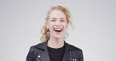 Buy stock photo Laughing, smile and portrait of woman in studio for comic expression, joke and goofy. Positive mindset, happiness and meme reaction with person on white background space for humor and good mood