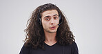 Portrait, telemarketing and man in studio, speaking and customer service on white background. Business, employee and person with headset, contact us and online consultation with telecom sales