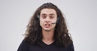 Buy stock photo Portrait, telemarketing and man in studio, conversation and customer service on white background. Help desk, advice and person with headset, contact us and online consultation with telecom sales
