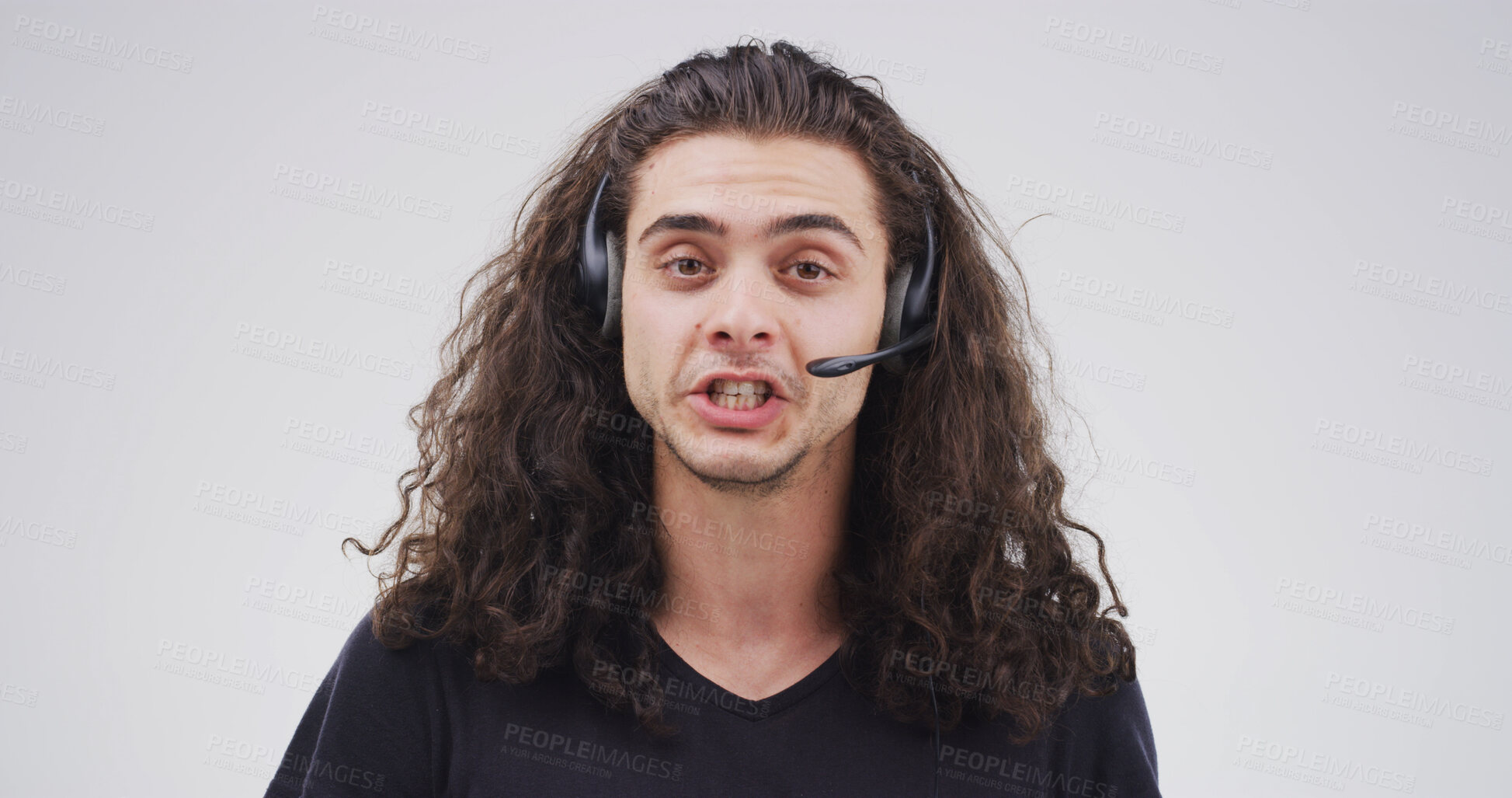 Buy stock photo Portrait, telemarketing and man in studio, conversation and customer service on white background. Help desk, advice and person with headset, contact us and online consultation with telecom sales
