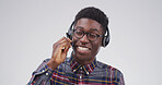 Black man, laugh and headset at call centre in studio for consultation, funny client and contact us. Smile, agent and mic for customer service, advice and listening to comic joke on white background