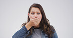 Shocked, portrait and woman in studio with face expression, bad news or negative announcement. Secret, surprise and cover mouth for gossip, drama and feedback or review of fail on a white background