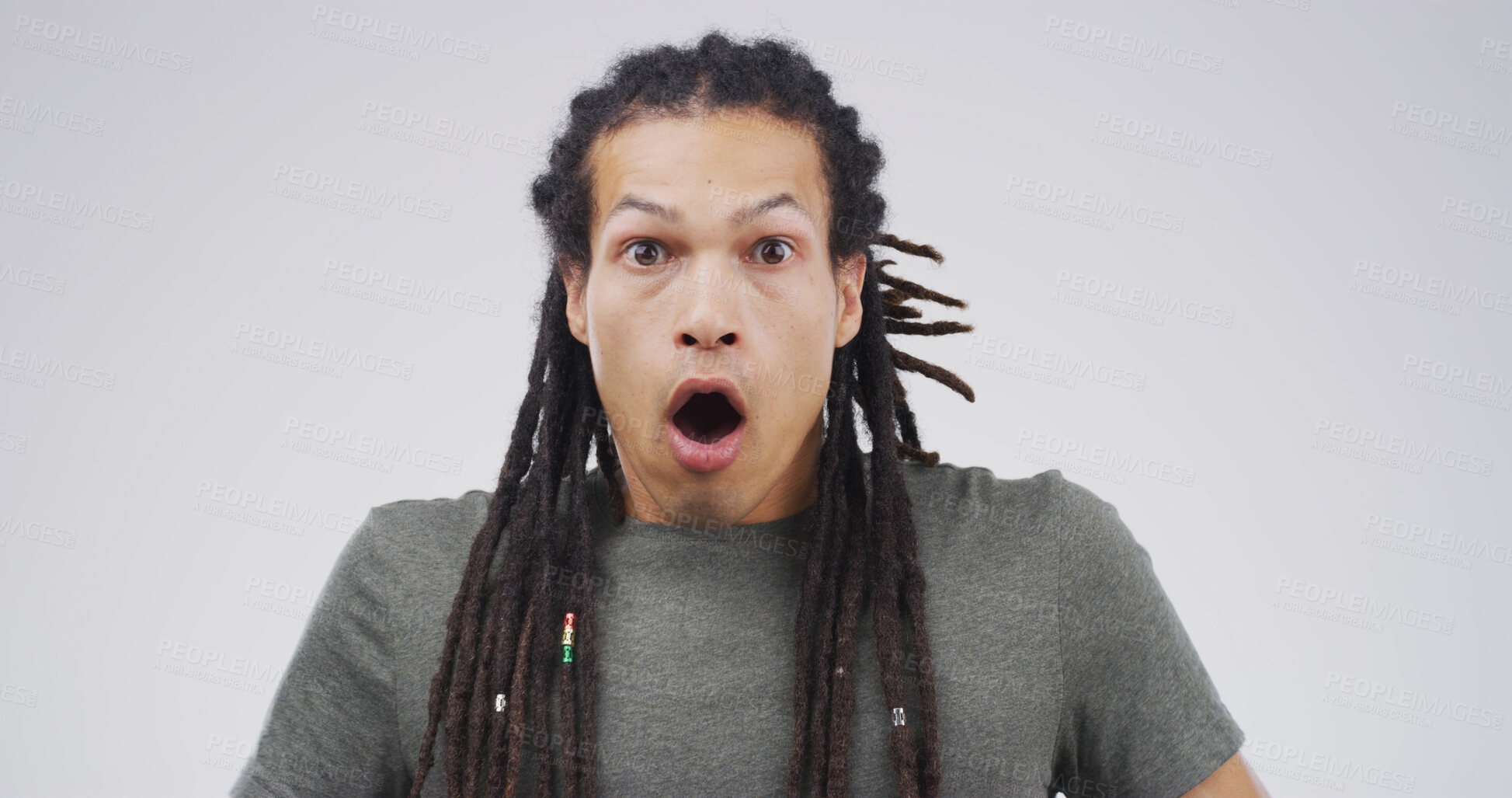 Buy stock photo Surprise, portrait and shocked man in studio with face expression, bad news or announcement. Rastafarian, surprise and mouth open for gossip, drama and feedback or review of fail on white background