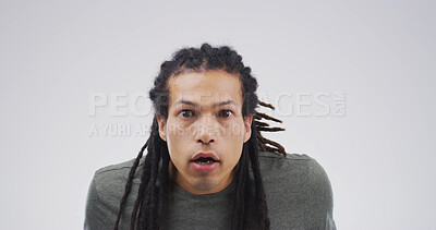 Buy stock photo Portrait, man and shocked emotions in studio for fake news, bad rumor and gossip drama. Male person, space and panic expression for horror story, danger risk and revelation secret on white background