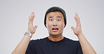 Portrait, Asian man and shocked in studio for fake news, bad rumor and gossip drama. Male person, space and mind blown reaction for horror story, danger risk and revelation secret on white background