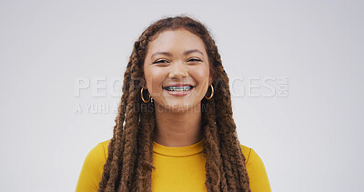 Buy stock photo Student, smile and portrait of woman in studio for college opportunity, pride and future. University, scholarship and education with person on white background space for learning, braces or happiness