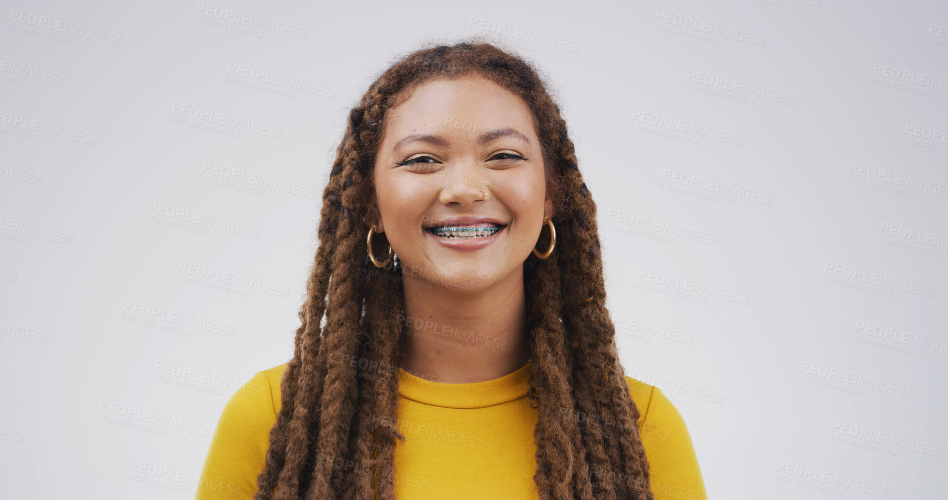 Buy stock photo Student, smile and portrait of woman in studio for college opportunity, pride and future. University, scholarship and education with person on white background space for learning, braces or happiness