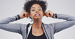 Studio, portrait and woman with funny face, facial expression or silly for humor, gesture and comic. White background, emoji and black person with reaction for comedy, goofy and confident in Kenya