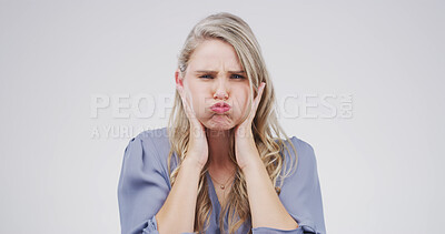 Buy stock photo Cheek, silly and portrait of woman in studio for funny face, humor and comedy on white background. Playful, mockup space and isolated person with positive mood, facial expression and weird for joke