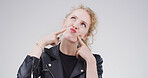 Funny face, pout and thinking with woman in studio for comic, meme and vision. Facial expression, comedy and reflection with person on white background space for good mood, goofy and silly emoji